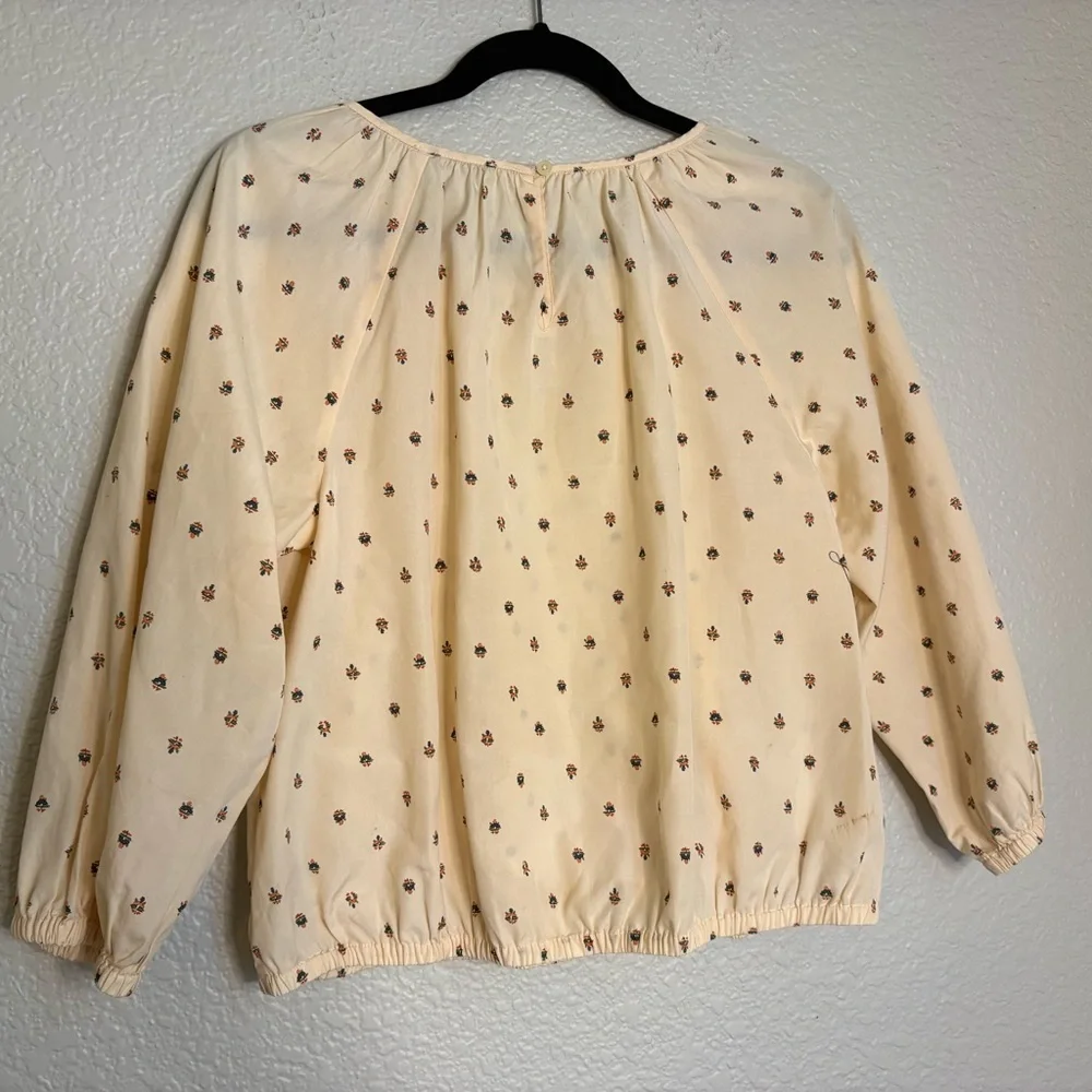 Madewell Floral cream colored puff sleeve and hem top